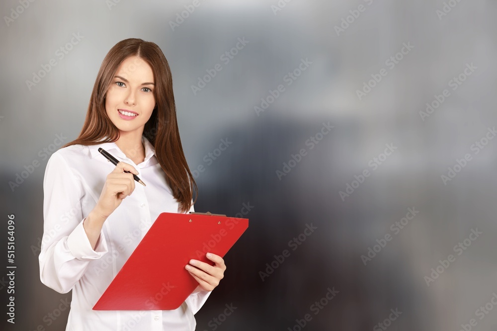 Portrait of smiling young woman waitress. Successful small business owner standing Portrait of smiling young woman waitress. Successful small business owner standing