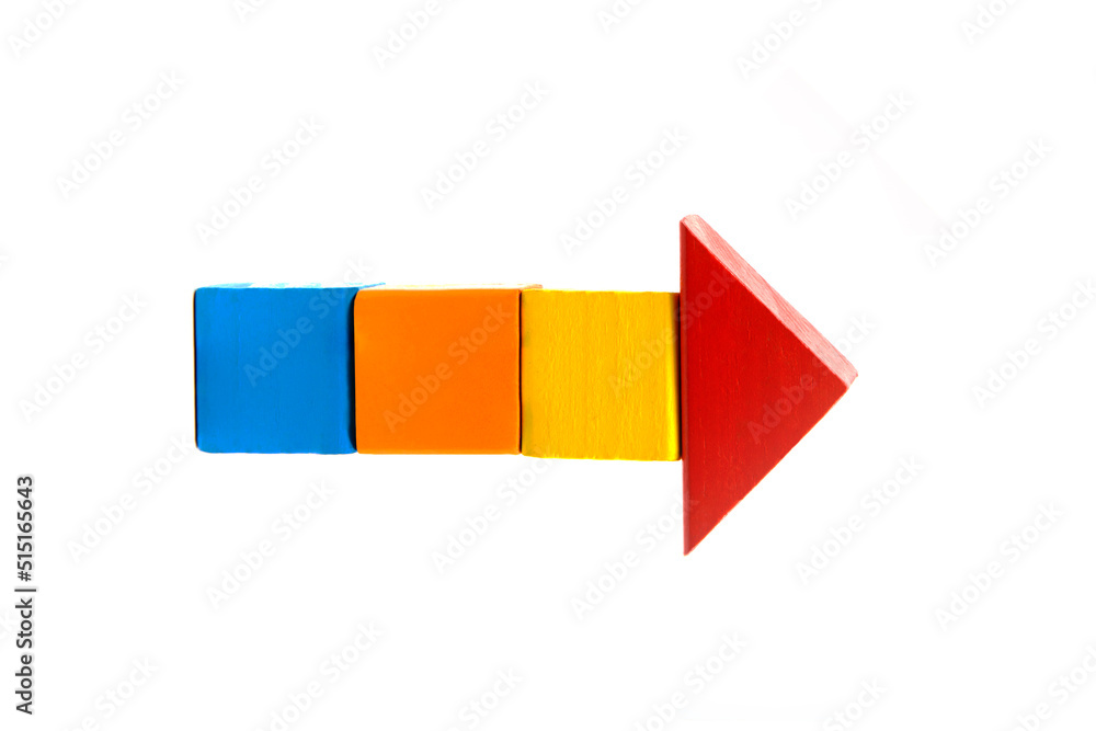 Fototapeta premium directional arrow signs made of wooden colorful building blocks isolated on white