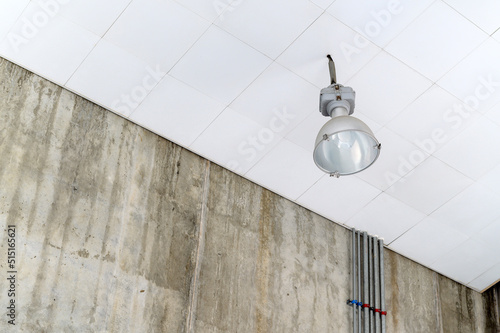 Fluorescent lamps on the modern ceiling