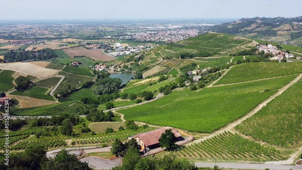 Europe, Italy , Pavia - Broni , - The castle of Cigognola - the vineyards of Oltrepo Pavese - area of wine production in Po Valley, drought and aridity. Drone aerial view Europe, Italy , Pavia - Broni , - The castle of Cigognola - the vineyards of Oltrepo Pavese - area of wine production in Po Valley, drought and aridity. Drone aerial view