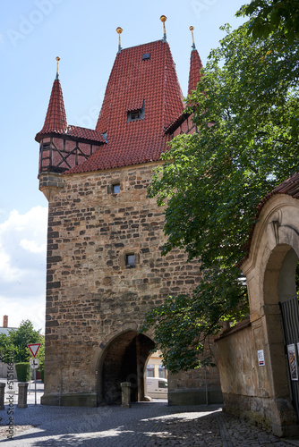 Rakovnik, Czech Republic - July 2, 2022 - the Gothic Prague tower from the 15th century on a sunny summer afternoon photo