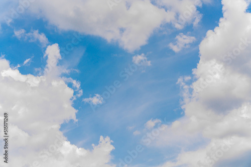 Beautiful white clouds on a bright blue background.