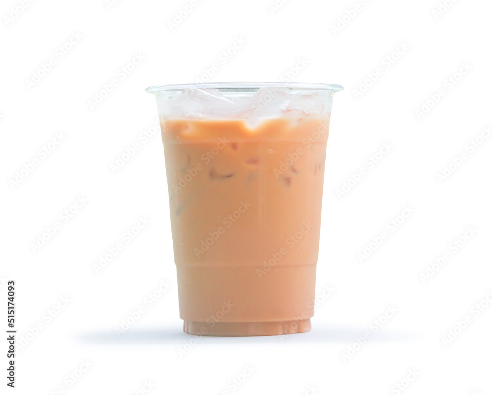 Orange Thai iced condensed milk tea in transparent plastic glass isolated on white background with clipping path Orange Thai iced condensed milk tea in transparent plastic glass isolated on white background with clipping path