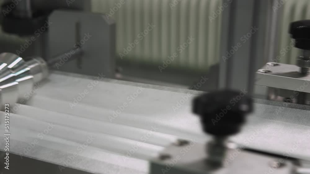 Surgical mask production process at the industrial factory. Automated