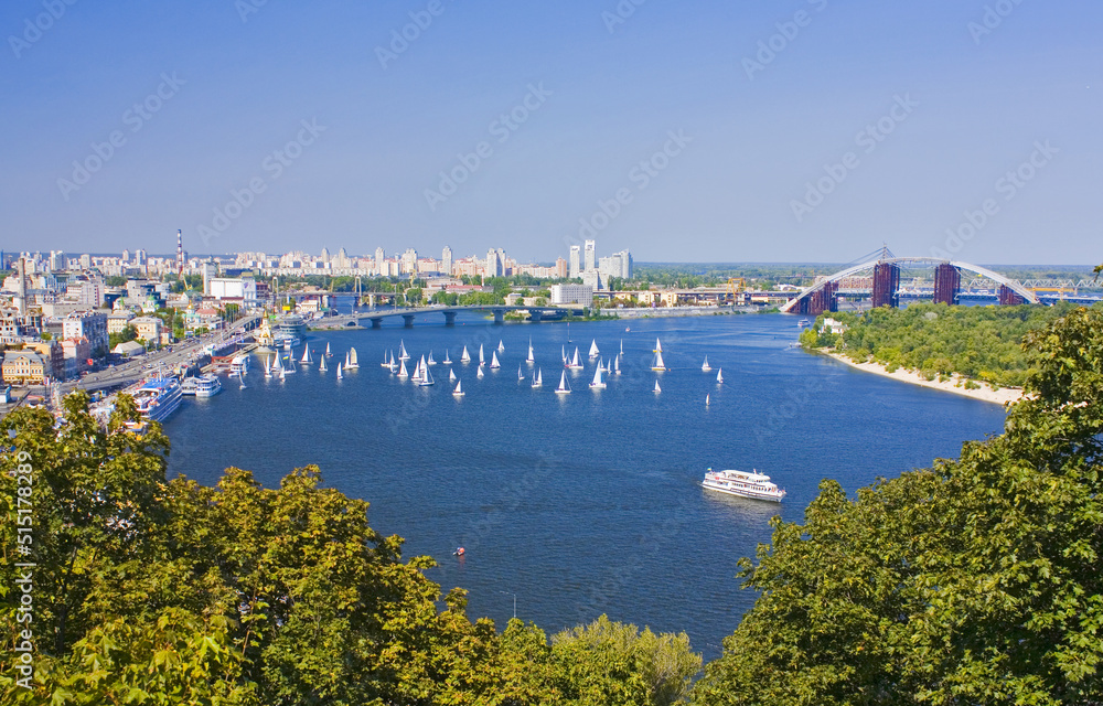 View of the embankment, River station and Dnieper river with yachts in Kyiv, Ukraine