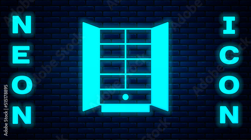 Glowing neon Wardrobe icon isolated on brick wall background. Cupboard sign. Vector