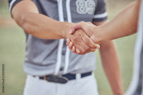 Closeup of two sportsmen shaking hands before a game. Hands pf baseball players congratulating each other after winning a match. Two unknown male competitors wishing each other goodluck on the field © Beaunitta V W/peopleimages.com