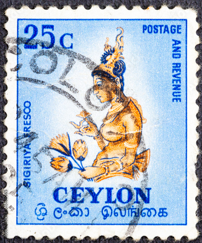 Ceylon - circa 1958 : Cancelled postage stamp printed by Ceylon, that shows Fresco of the Sigiriya-Rock 5th Century, circa 1958.