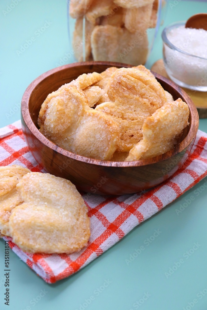 Palmiers cookie. Also known as elephant ear or Pig ear puff pastry cookies. classic French pastry. Sugar French Hearts. Copy space. Palmiers cookie. Also known as elephant ear or Pig ear puff pastry cookies. classic French pastry. Sugar French Hearts. Copy space.