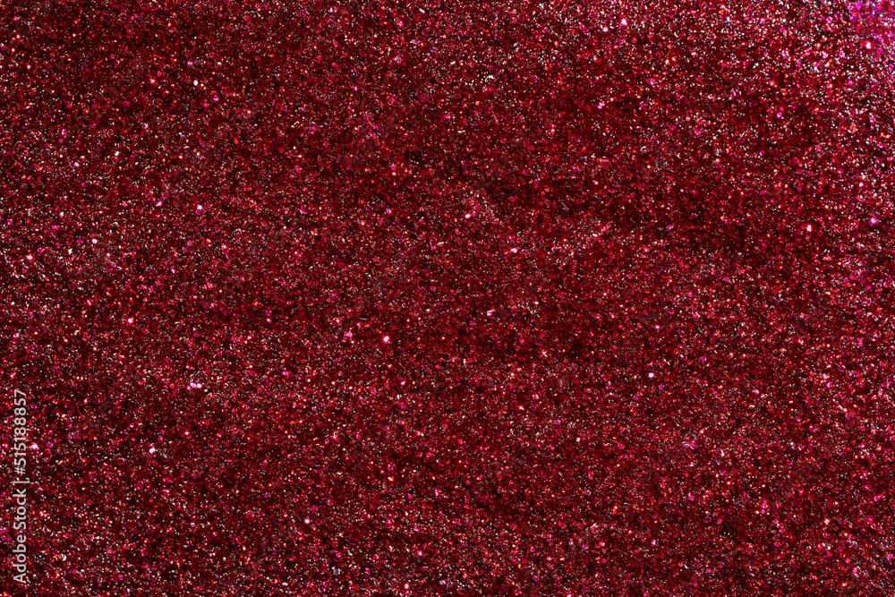 Red glitter nail polish texture. Celebration holiday background
