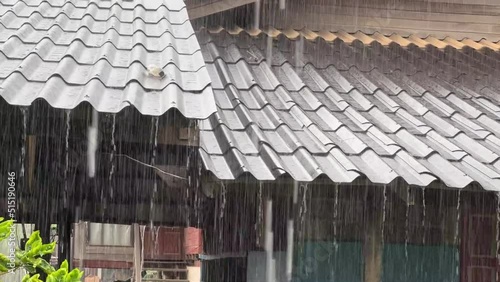 Rain flowing down from the roof house