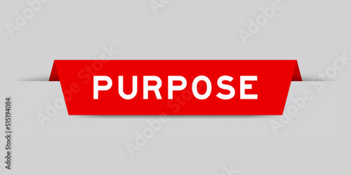 Red color inserted label with word purpose on gray background