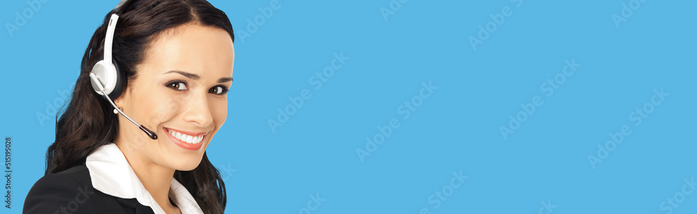 Call center service. Customer support phone sales operator in headset showing thumb up gesture, isolated on blue background with copy space area for text or slogan.