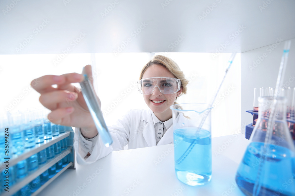 closeup.portrait of doctor biologist in the lab. closeup.portrait of doctor biologist in the lab.