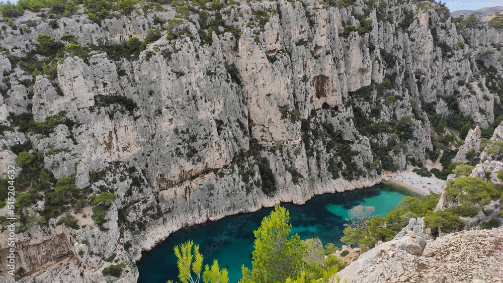 The Calanques National Park is a French national park located on the Mediterranean coast in Bouches-du-Rhône, Southern France. The beach of En-Vau and it's high limestone cliffs near Cassis.