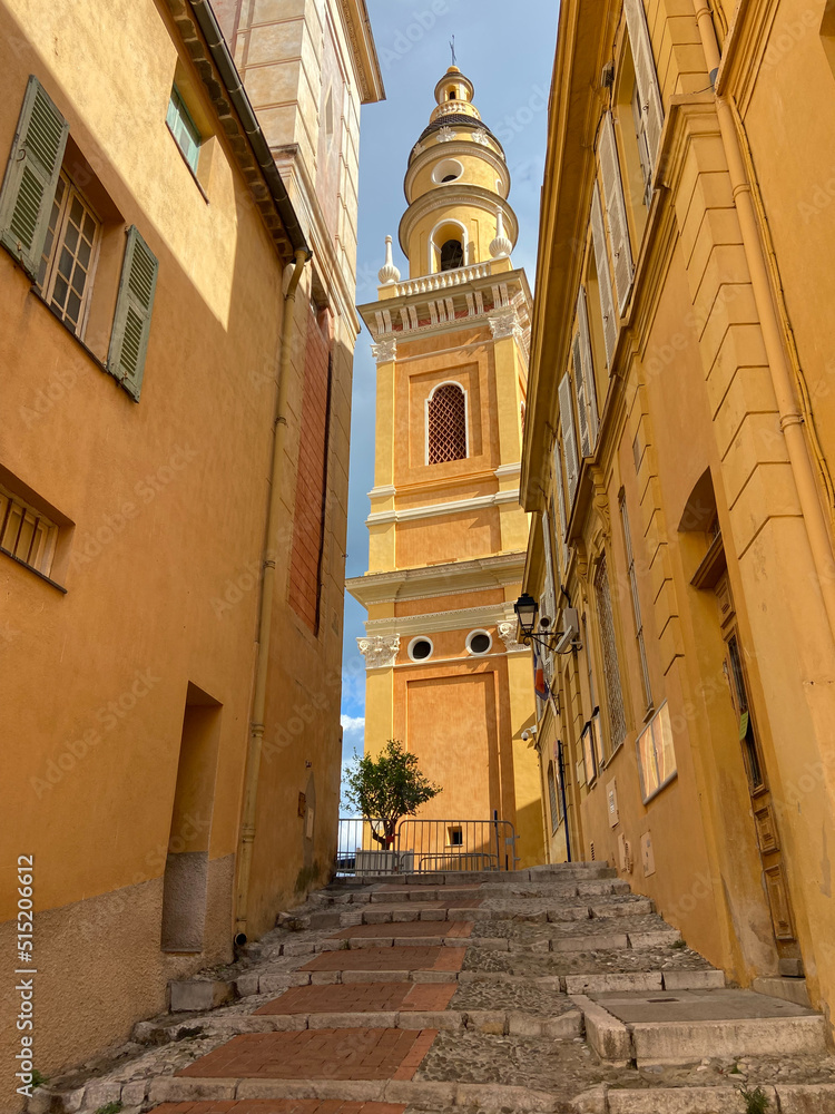 The Basilica of Saint-Michael the Archangel in Menton, France. The tall bell tower on the right side of the church was added at the beginning of the 18th century.