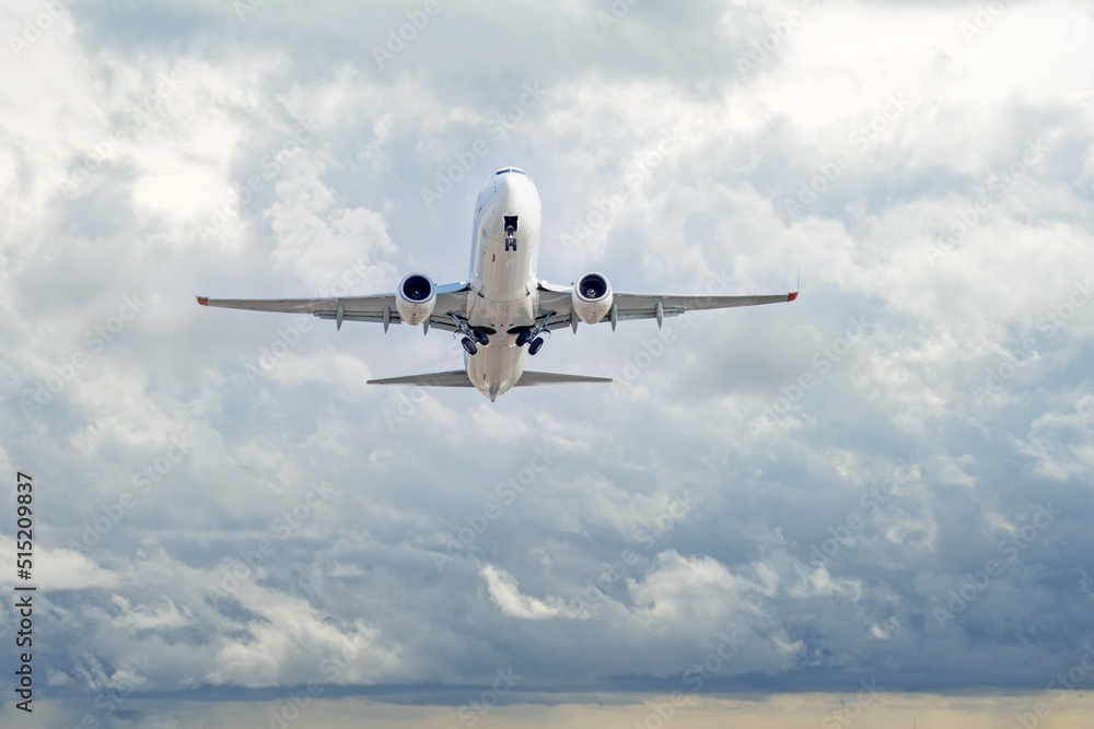 Fototapeta premium Airplane take off airport during bright day.