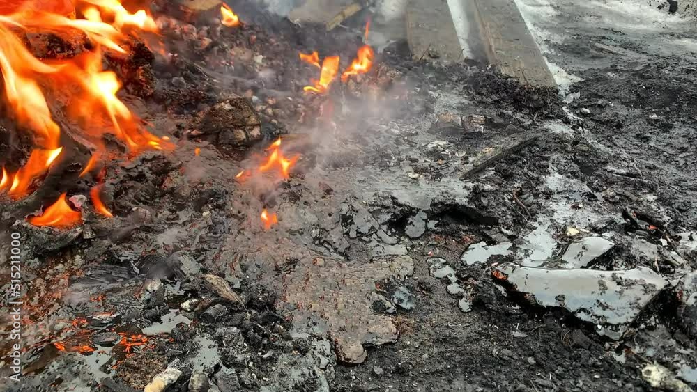 The hot dangerous liquid bubbles up releasing hazardous chemicals into the air. Boiling lava on fire. Pollution of ecology and environment. The hot dangerous liquid bubbles up releasing hazardous chemicals into the air. Boiling lava on fire. Pollution of ecology and environment.