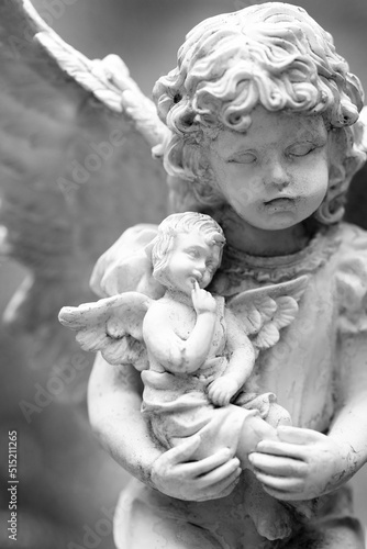 Fotografia Cherub Angel Sculpture with Wings Representing Love Faith and Peace Spirit