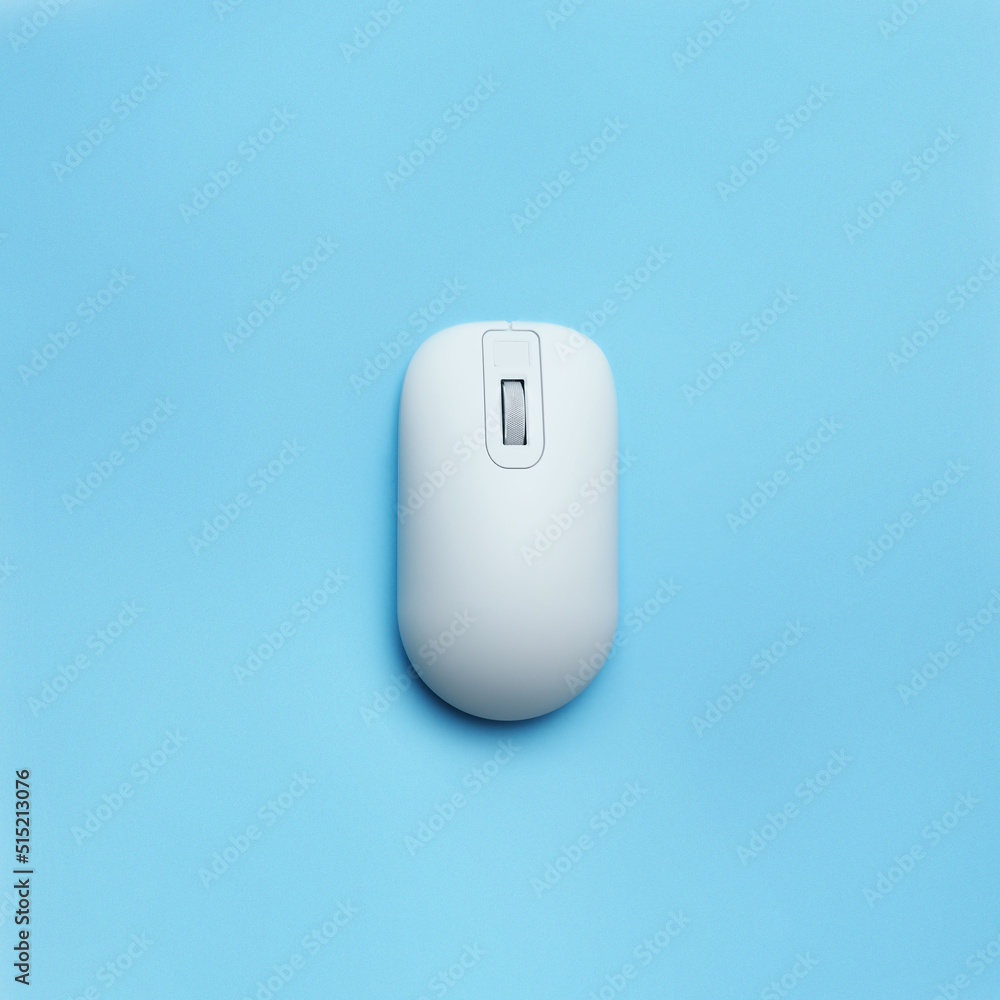 Modern wireless computer mouse on light blue background, top view Modern wireless computer mouse on light blue background, top view