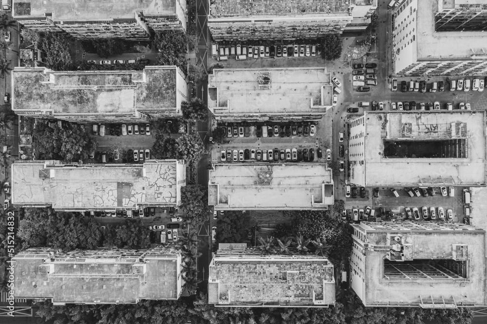 a top-down aerial view of old industrial buildings in downtown shenzhen, china (monochrome)