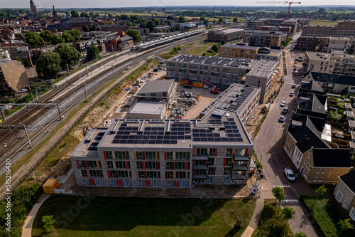 Aerial housing shortage and engineering. Construction site Ubuntuplein in urban development real estate investment project in new Noorderhaven neighbourhood.