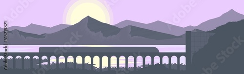 Panorama of mountains, with railroad tracks and trains running through the river.