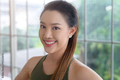 Free Download Portrait of fit young woman wearing sportswear at home, sport and healthy lifestyle concept. - GFXLoad