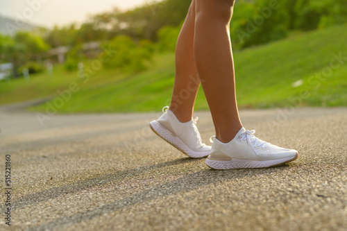 Close up of fit sporty woman's legs in running shoes, Health and sport concept.