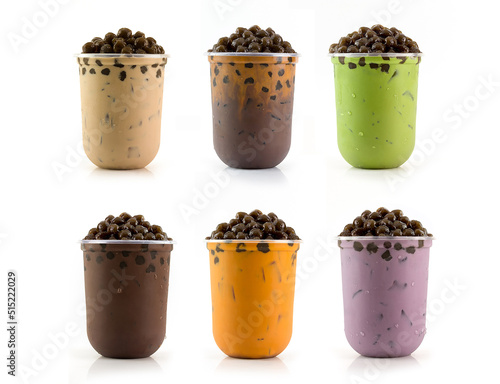 Various flavored bubble tea drinks on a white background