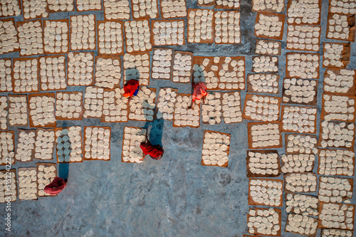 Wallpaper Mural Aerial view of Women at work on the preparation of natural fabric, Barga, Rajshahi, Bangladesh. Torontodigital.ca