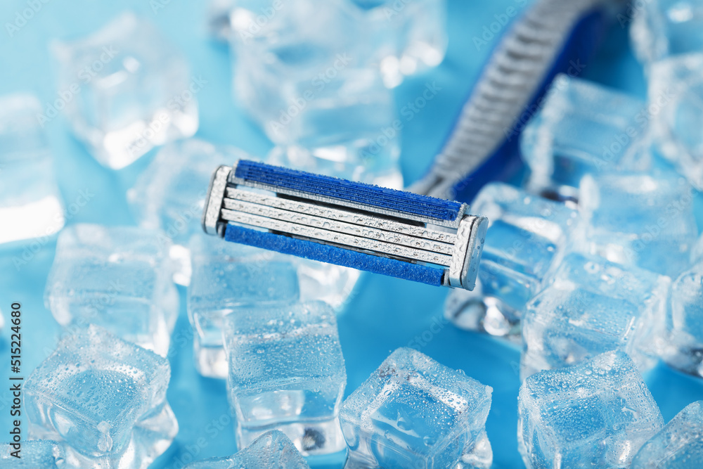 Refreshing shaving machines for the face against the background of frosty ice cubes Refreshing shaving machines for the face against the background of frosty ice cubes