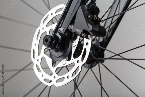 Bicycle brake rotor with hydraulic caliper. Brake system on a gravel bike