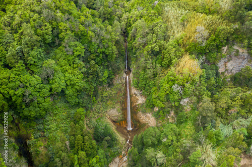 Aerial View of waterfall in the forest, Cascata da Ribeira Quente, Ribeira Quente, Azores, Portugal. photo