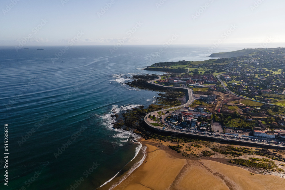 Aerial view of Gijon town along the coast with Playa de San Lorenzo, Asturias, Spain. Aerial view of Gijon town along the coast with Playa de San Lorenzo, Asturias, Spain.