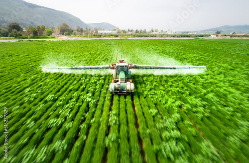 Aerial View of sprinkler at work among the cultivated fields, Beit Alfa, Northern District, Israel.