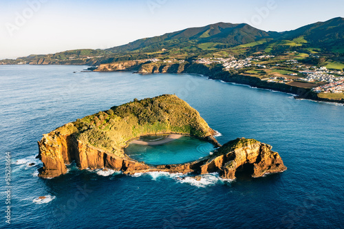Aerial view of the small, volcanic island Vila Franco do Compa at sunrise, Sao Miguel, Azores, Portugal. photo