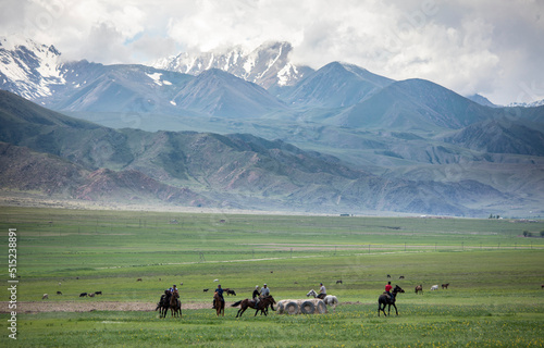 Men play a game of Kok Boru, or dead goat polo, in the mountains of Kyrgyzstan.