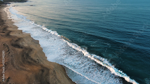 Beach Shore Aerial Drone Above ocean coastline tropical calm quiet meditative paradise 
