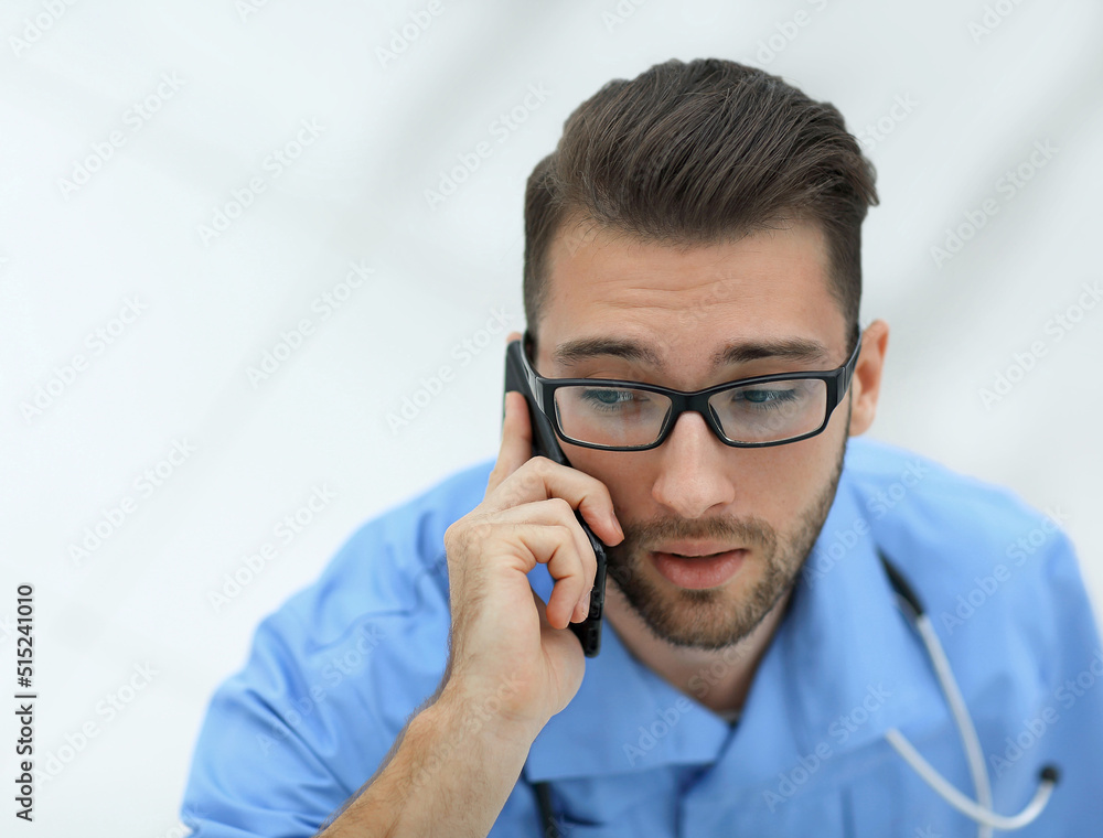 doctor speaking on the phone