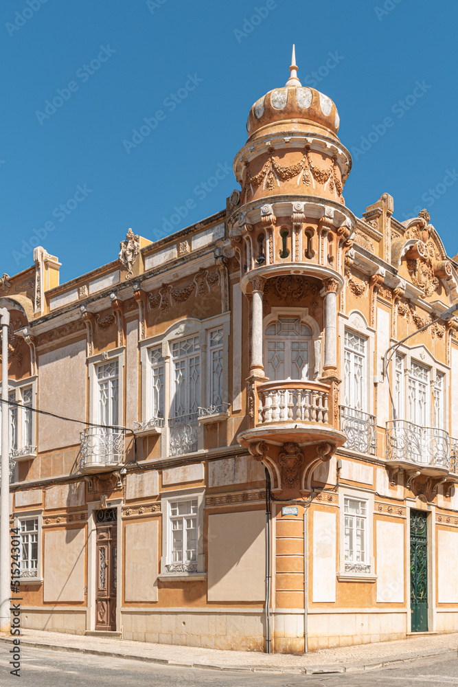 Facade of a old traditional house in the historic center of Faro, a town located in the Algarve region in the Faro district, Portugal