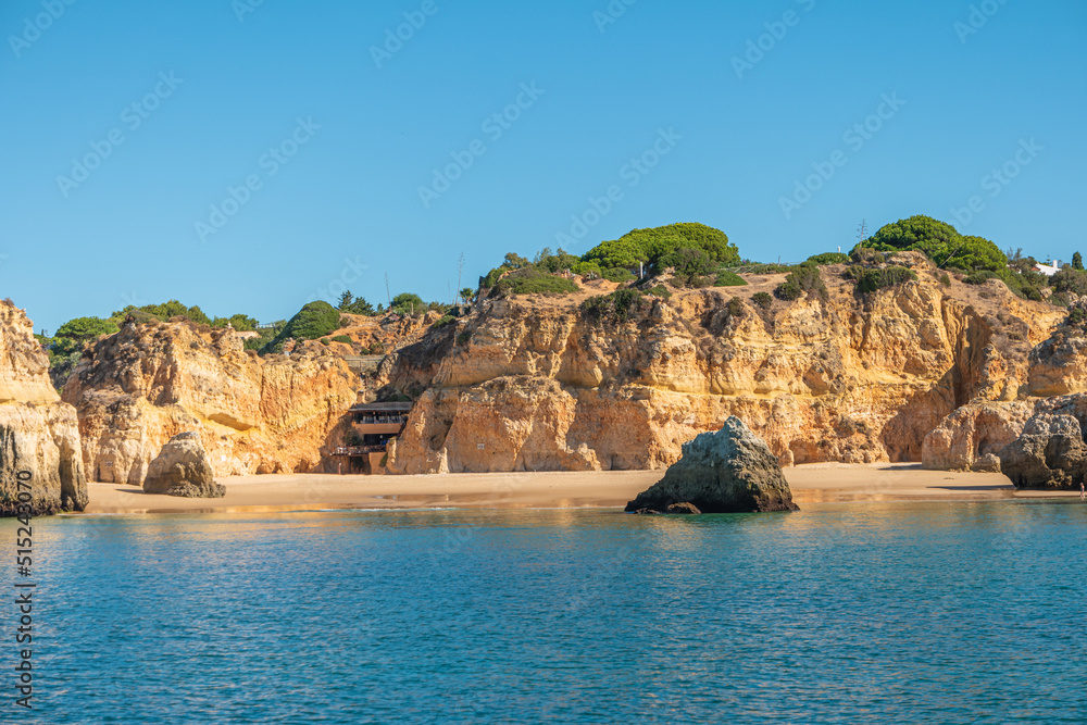 Algarve coast with the cliffs, caves and beaches seen from the sea