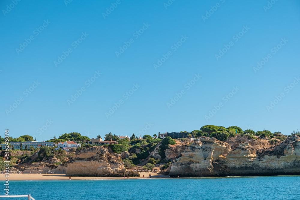Algarve coast with the cliffs, caves and beaches seen from the sea