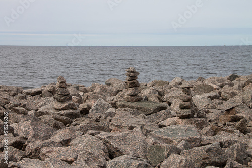 on the seashore there are figures made of stones © eevlada