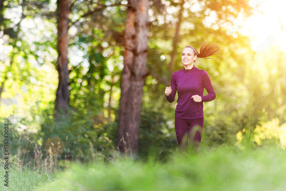 Beautiful smiling girl runs through the morning forest. Beautiful smiling girl runs through the morning forest.