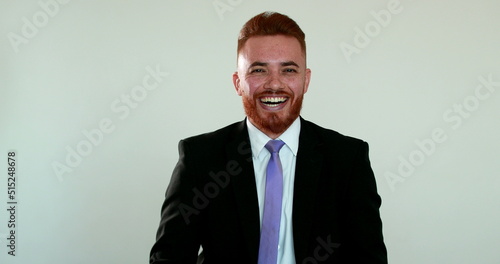 Man spontaneous smile and laugh portrait, business entrepreneur authentic real life laughing