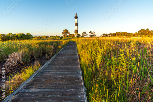 Fototapeta Naklejka Na Ścianę i Meble -  Bodie Island Lighthouse and boardwalk Summer Landscape, at Cape Hatteras National Seashore, North Carolina, USA.