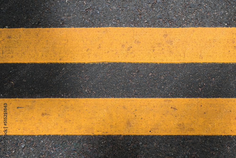 Fototapeta premium Asphalt texture background yellow line road surfaces