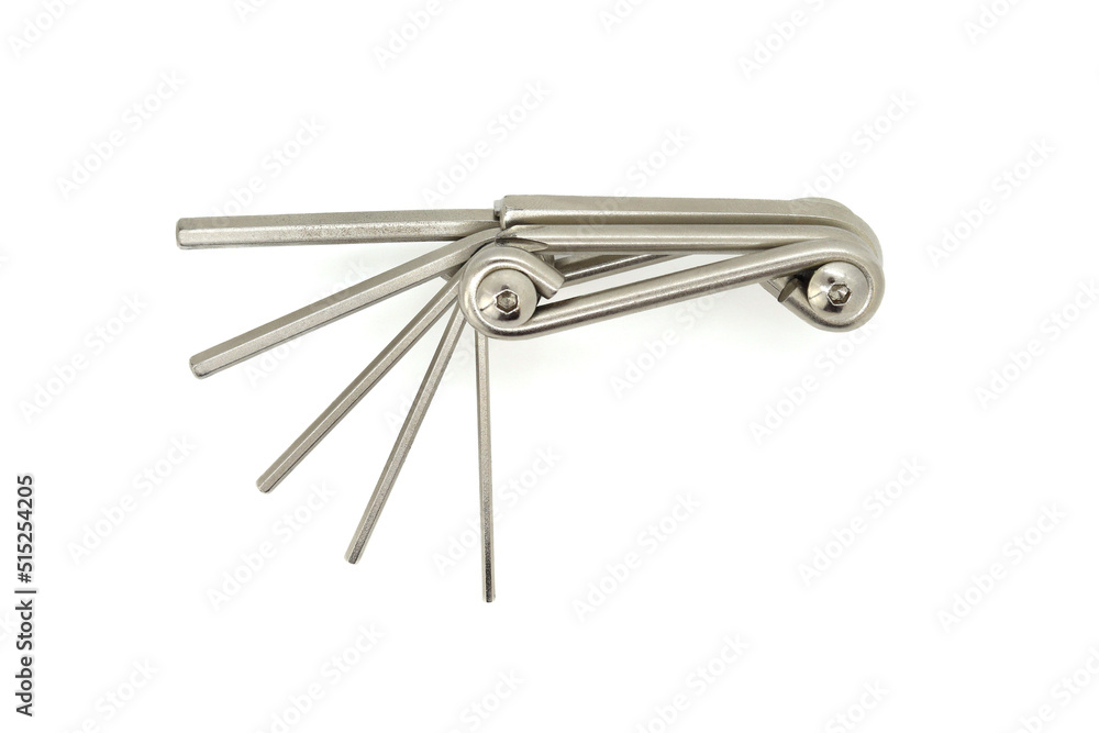 Bicycle multifunctional tool kit on a white background. Multifunctional tool for cycling, a set of hexagons for a bicycle, top view. Bicycle multifunctional tool kit on a white background. Multifunctional tool for cycling, a set of hexagons for a bicycle, top view.