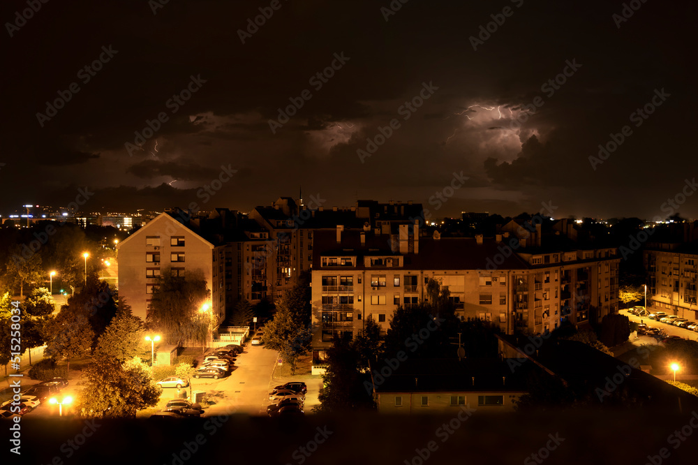 Storm clouds with thunder and lightning approaching fast over Zagreb city, bringing heavy rain and hail iduring the night